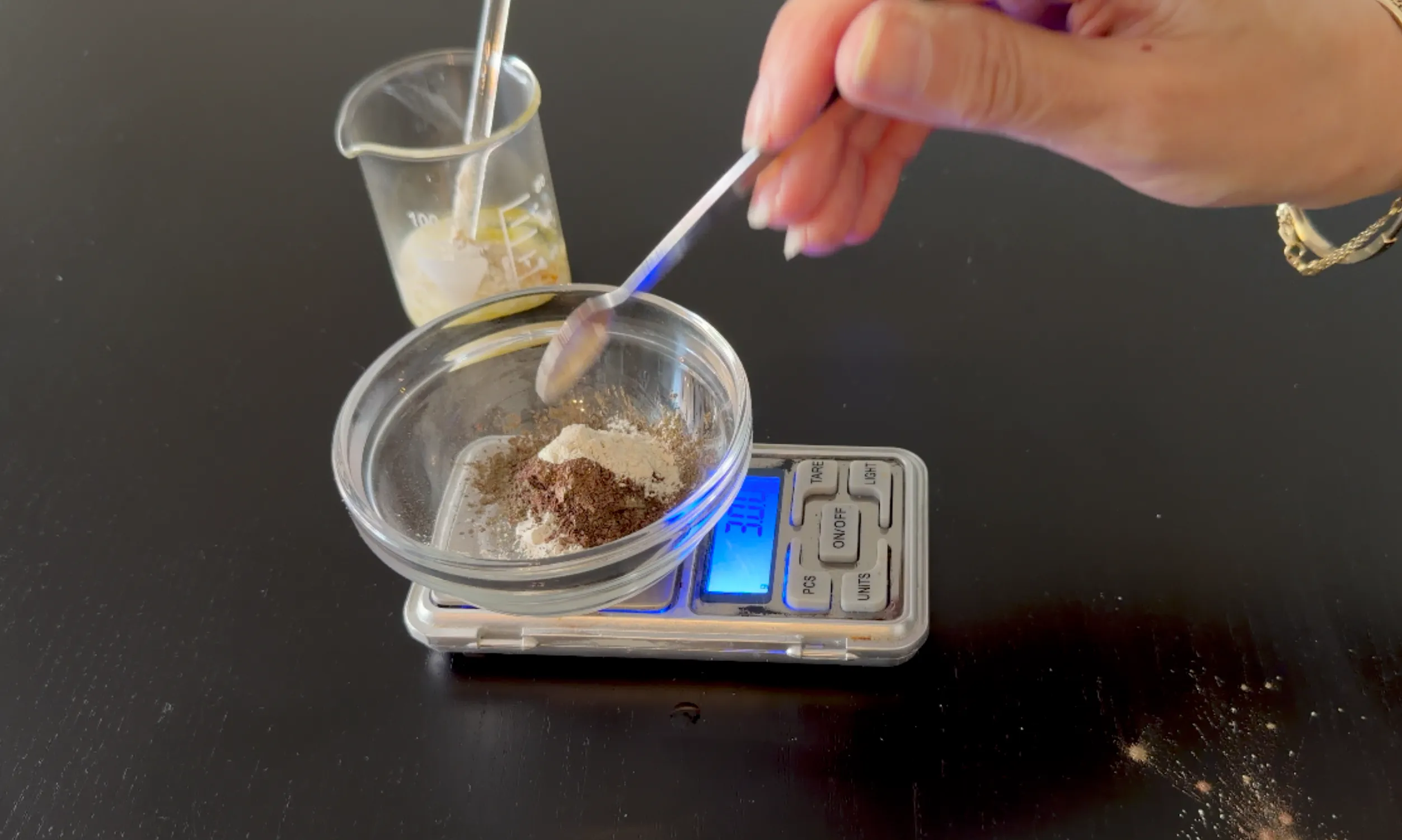 Swatching the dry powder blend on the back of the hand